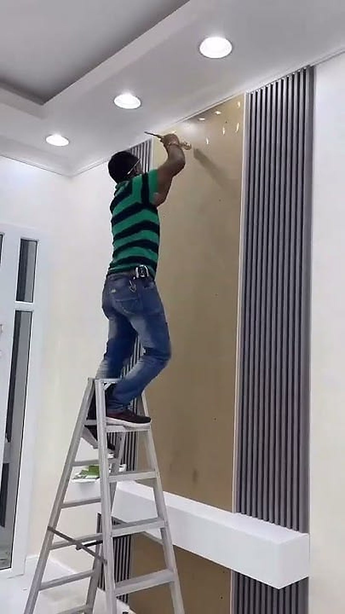 Fitting a fluted wall panel